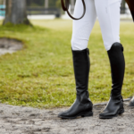 A rider wearing Ariat Riding Boots