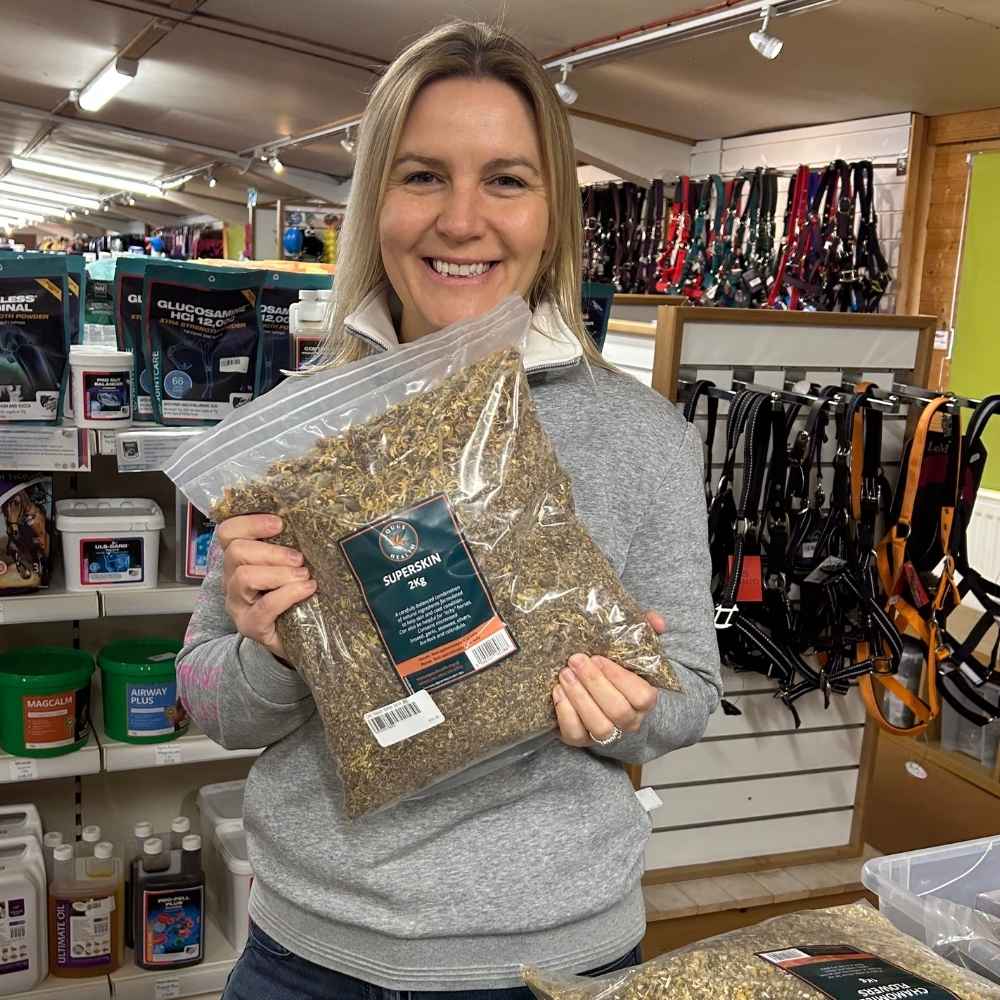 Kathryn Jaquet holds a pack of Equus Health Super Skin at RB Equestrian