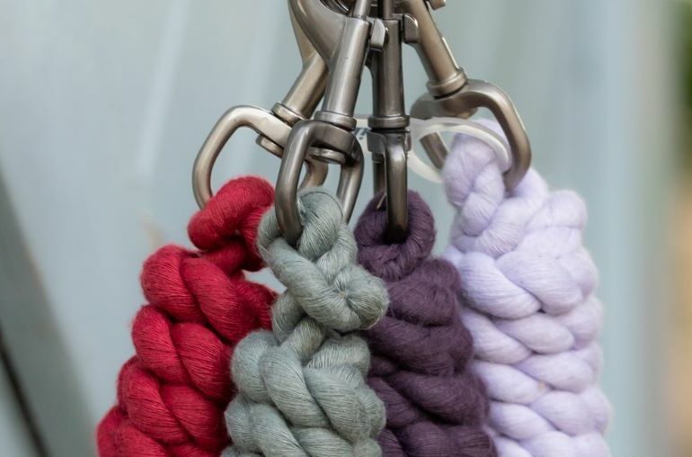 Four leadropes hanging from a clip